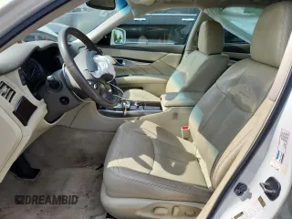2013 Infiniti M with VIN JN1BY1AR5DM602690, listed as a Copart auction lot 64944925 with 186,302 mi miles and Salvage title. Bid and sale history available at DreamBid. Image 7.