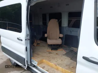 2019 Ford Transit with VIN 1FTYR2CM3KKB23365, listed as a IAAI auction lot 42439088 with 137,166 mi miles and . Bid and sale history available at DreamBid. Image 8.