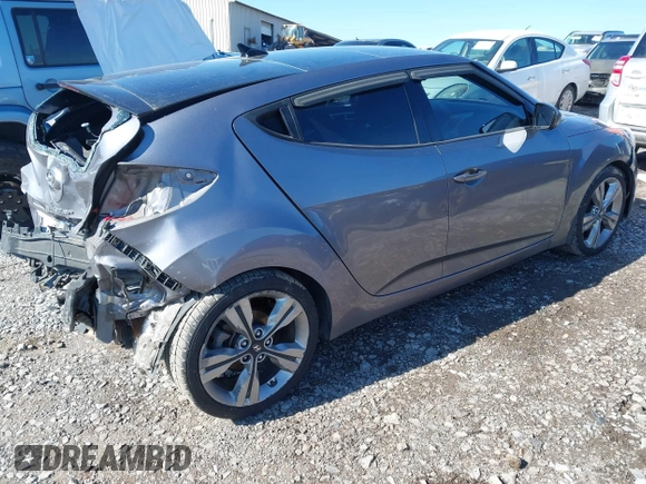 2016 Hyundai Veloster z VIN KMHTC6AD9GU264048, wystawiony jako IAAI lot #41634443 z przebiegiem 103 758 mil mil oraz . Historia ofert i sprzedaży dostępna na DreamBid. Obrazek 4.