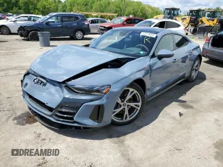 2023 Audi e-tron GT Premium Plus z VIN WAUFJBFW2P7003754, wystawiony jako Copart lot #53279094 z przebiegiem 7286 mil mil oraz . Historia ofert i sprzedaży dostępna na DreamBid. Obrazek 1.