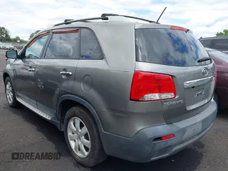 2012 Kia Sorento LX with VIN 5XYKT3A60CG285902, listed as a IAAI auction lot 42142043 with 225,206 mi miles and . Bid and sale history available at carsss.com. Image 3.