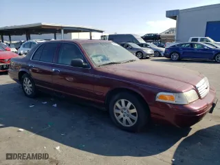 2006 Ford Crown Victoria LX with VIN 2FAFP74W76X129351, listed as a Copart auction lot 65493704 with 0 mi miles and Clean Title. Bid and sale history available at carsss.com. Image 4.
