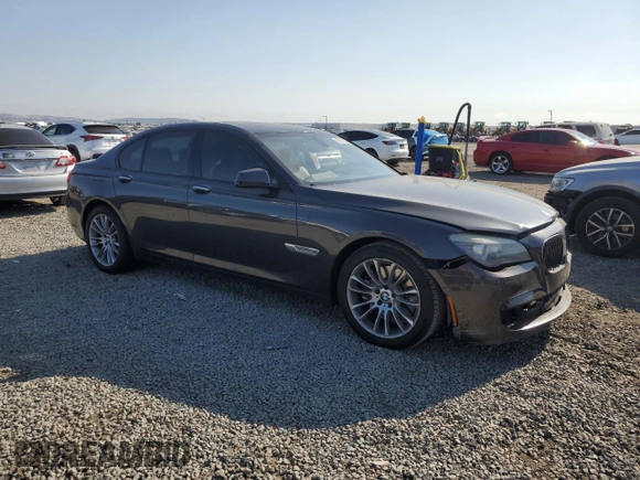 2011 BMW 7 Series 750i with VIN WBAKA8C58BCY37346, listed as a Copart auction lot 65017655 with 125,505 mi miles and Salvage title. Bid and sale history available at DreamBid. Image 4.