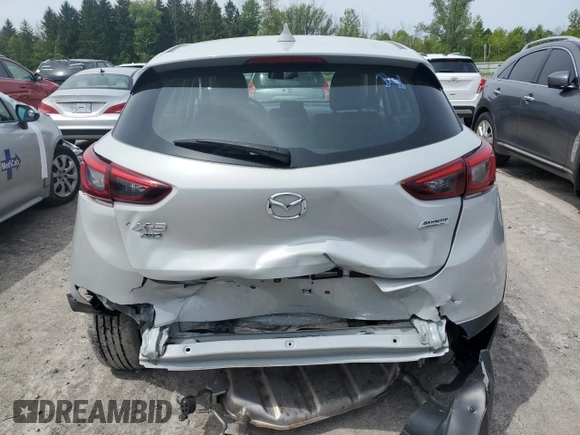 2019 Mazda CX-3 Touring z VIN JM1DKFC76K1451342, wystawiony jako Copart lot #58413935 z przebiegiem 21 391 mil mil oraz Szkoda całkowita • Salvage title. Historia ofert i sprzedaży dostępna na DreamBid. Obrazek 6.
