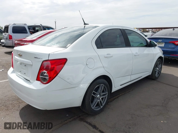2013 Chevrolet Sonic LS with VIN 1G1JA5SH9D4249356, listed as a IAAI auction lot 42373352 with 151,337 mi miles and . Bid and sale history available at DreamBid. Image 4.