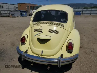 1969 Volkswagen Beetle with VIN 1191032049, listed as a Copart auction lot 55768275 with 6,077 mi miles and Salvage Title. Bid and sale history available at DreamBid. Image 6.