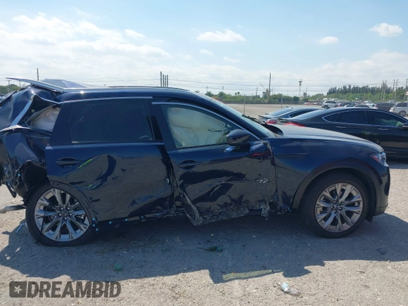 2024 Mazda CX-90 Premium Plus with VIN JM3KKEHD8R1186750, listed as a IAAI auction lot 41795353 with 5,144 mi miles and . Bid and sale history available at DreamBid. Image 13.