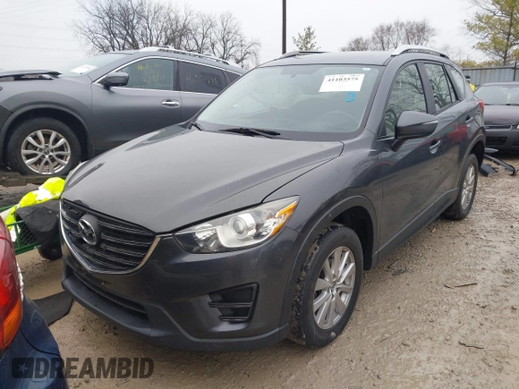 2016 Mazda CX-5 Sport with VIN JM3KE4BY5G0885754, listed as a IAAI auction lot 41103575 with 136,263 mi miles and . Bid and sale history available at carsss.com. Image 18.