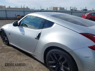 2018 Nissan 370Z Sport with VIN JN1AZ4EH7JM572602, listed as a IAAI auction lot 41902662 with 76,262 mi miles and . Bid and sale history available at DreamBid. Image 14.