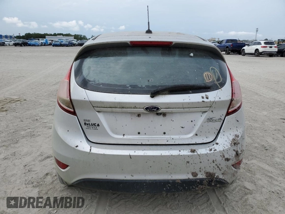 2018 Ford Fiesta SE with VIN 3FADP4EJ9JM140476, listed as a Copart auction lot 55977705 with Not Provided miles and Clean Title. Bid and sale history available at DreamBid. Image 6.