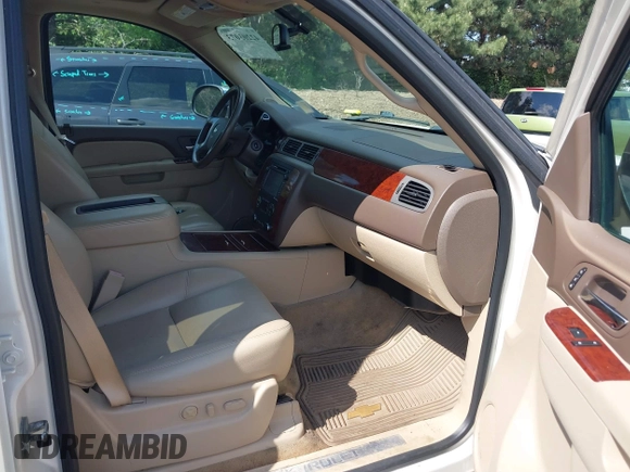 2013 Chevrolet Tahoe LTZ with VIN 1GNSKCE07DR326996, listed as a IAAI auction lot 42203073 with 147,067 mi miles and . Bid and sale history available at DreamBid. Image 5.