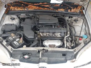 2001 Honda Civic LX with VIN 1HGEM21541L087029, listed as a IAAI auction lot 41972872 with 226,268 mi miles. Bid and sale history available at carsss.com. Image 10.