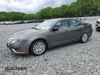 2011 Ford Fusion Hybrid с VIN 3FADP0L31BR116626, выставлен на аукционе Copart как лот 58470445 с пробегом Не указан миль и Списание • Salvage title. История ставок и продаж доступна на DreamBid. Изображение 1.