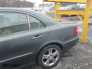 2006 Mercedes-Benz E-Class 3.5L with VIN WDBUF87J26X207923, listed as a IAAI auction lot 41479006 with 154,024 mi miles. Bid and sale history available at carsss.com. Image 6.