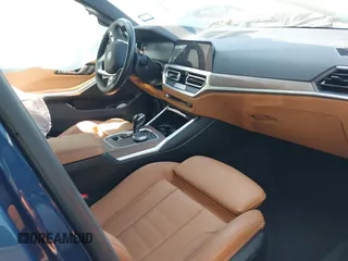 2021 BMW 3 Series 330i z VIN 3MW5R1J00M8C08985, wystawiony jako IAAI lot #41977683 z przebiegiem 34 640 mil mil oraz . Historia ofert i sprzedaży dostępna na DreamBid. Obrazek 5.