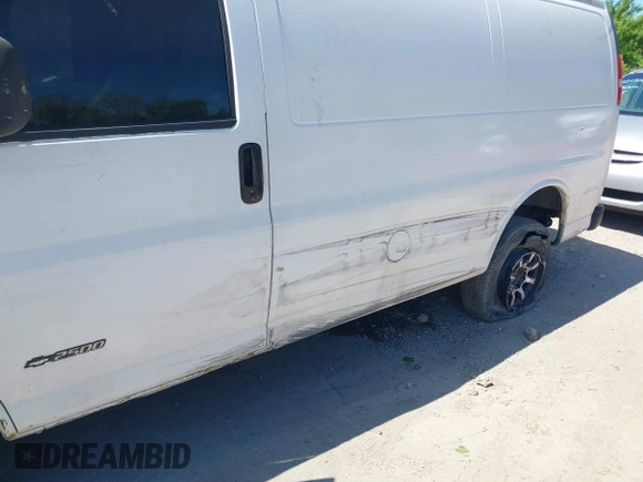 2004 Chevrolet Express Cargo Van with VIN 1GCGG25V441118708, listed as a IAAI auction lot 42144915 with 327,928 mi miles. Bid and sale history available at carsss.com. Image 6.