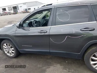 2016 Jeep Cherokee Limited with VIN 1C4PJLDBXGW211996, listed as a IAAI auction lot 42465945 with 153,067 mi miles and . Bid and sale history available at DreamBid. Image 14.