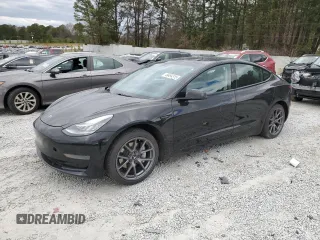 2021 Tesla Model 3 Standard Range Plus with VIN 5YJ3E1EA3MF854008, listed as a Copart auction lot 49494315 with 220,354 mi miles and Clean Title. Bid and sale history available at DreamBid. Image 1.