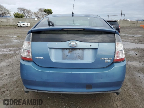 2005 Toyota Prius z VIN JTDKB20U153026520, wystawiony jako Copart lot #50978655 z przebiegiem 237 511 mil mil oraz Szkoda całkowita • Salvage title. Historia ofert i sprzedaży dostępna na DreamBid. Obrazek 6.