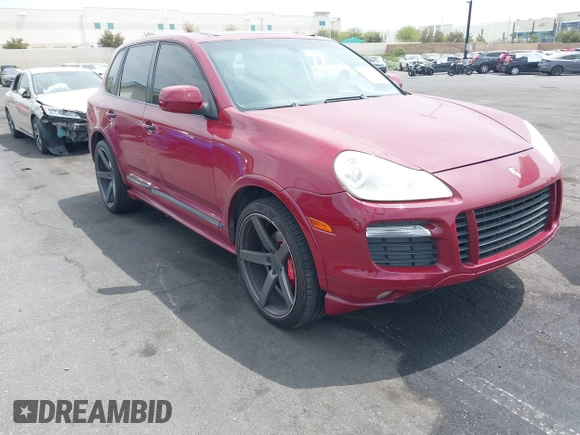 2009 Porsche Cayenne GTS z VIN WP1AD29P29LA61154, wystawiony jako IAAI lot #42024808 z przebiegiem 174 574 mil mil oraz . Historia ofert i sprzedaży dostępna na DreamBid. Obrazek 1.