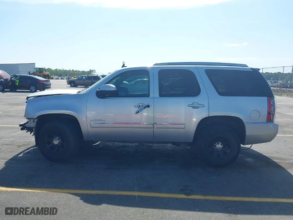 2011 GMC Yukon Denali with VIN 1GKS2EEF8BR346281, listed as a IAAI auction lot 42076037 with 264,311 mi miles. Bid and sale history available at carsss.com. Image 14.