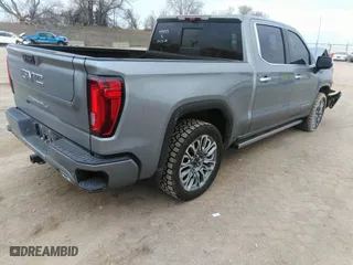 2023 GMC Sierra 1500 Denali Ultimate with VIN 1GTUUHEL2PZ270179, listed as a IAAI auction lot 41263065 with 23,712 mi miles. Bid and sale history available at carsss.com. Image 4.