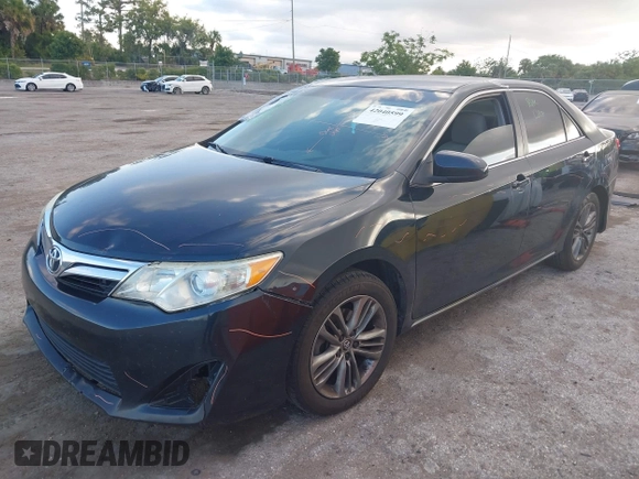 2014 Toyota Camry L with VIN 4T4BF1FK7ER349244, listed as a IAAI auction lot 42040599 with 186,545 mi miles. Bid and sale history available at carsss.com. Image 2.