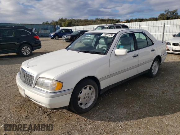 1995 Mercedes-Benz C with VIN WDBHA28E1SF151911, listed as a Copart auction lot 76814424 with 128,184 mi miles and Clean Title. Bid and sale history available at carsss.com. Image 1.