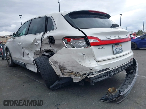 2016 Lincoln MKX Select with VIN 2LMTJ6KR5GBL30010, listed as a IAAI auction lot 41741385 with 112,647 mi miles. Bid and sale history available at carsss.com. Image 6.