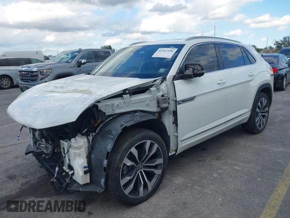 2021 Volkswagen Atlas SEL Premium R-Line with VIN 1V2FE2CA2MC206046, listed as a IAAI auction lot 41547596 with 13,805 mi miles and . Bid and sale history available at DreamBid. Image 2.