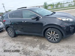 2017 Kia Sportage EX z VIN KNDPNCAC4H7072137, wystawiony jako IAAI lot #42298888 z przebiegiem 123 417 mil mil oraz . Historia ofert i sprzedaży dostępna na DreamBid. Obrazek 1.