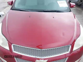 2011 Chevrolet Traverse LTZ z VIN 1GNKRLED6BJ142238, wystawiony jako IAAI lot #42183153 z przebiegiem 149 483 mil mil oraz . Historia ofert i sprzedaży dostępna na DreamBid. Obrazek 6.
