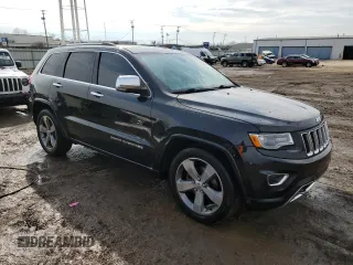 2016 Jeep Grand Cherokee Overland with VIN 1C4RJFCG8GC402339, listed as a Copart auction lot 47553385 with 121,486 mi miles and Salvage title. Bid and sale history available at DreamBid. Image 4.