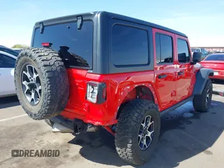 2020 Jeep Wrangler Unlimited Rubicon with VIN 1C4HJXFG2LW214874, listed as a IAAI auction lot 41679397 with 66,294 mi miles and . Bid and sale history available at DreamBid. Image 6.