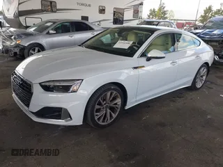 2023 Audi A5 Sportback Premium z VIN WAUABCF54PA052249, wystawiony jako IAAI lot #41916508 z przebiegiem 19 062 mil mil oraz . Historia ofert i sprzedaży dostępna na DreamBid. Obrazek 17.