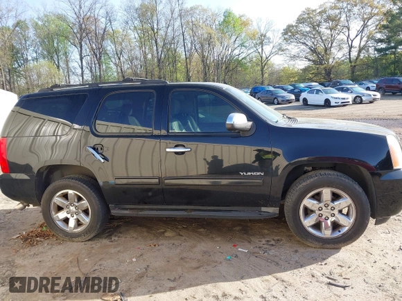 2011 GMC Yukon SLT with VIN 1GKS2CE02BR109155, listed as a IAAI auction lot 41925194 with 238,479 mi miles. Bid and sale history available at carsss.com. Image 12.