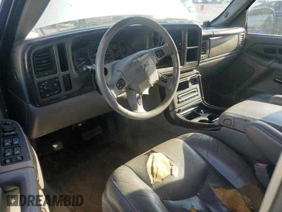 2005 GMC Sierra Denali z VIN 2GTEK63N551369622, wystawiony jako Copart lot #51992945 z przebiegiem 165 971 mil mil oraz Szkody całkowita. Historia ofert i sprzedaży dostępna na DreamBid. Obrazek 8.