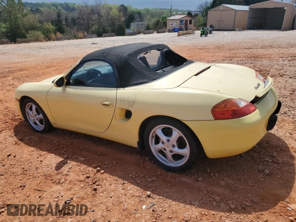 1998 Porsche Boxster с VIN WP0CA2982WU623104, выставлен на аукционе Copart как лот 50941005 с пробегом 78 486 миль миль и Чистый • Clean title. История ставок и продаж доступна на DreamBid. Изображение 2.