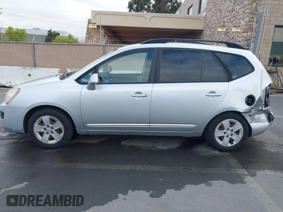 2009 Kia Rondo LX with VIN KNAFG528497222225, listed as a IAAI auction lot 42108192 with 113,040 mi miles. Bid and sale history available at carsss.com. Image 15.