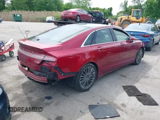 2014 Lincoln MKZ z VIN 3LN6L2G93ER802398, wystawiony jako IAAI lot #42205802 z przebiegiem 187 511 mil mil oraz . Historia ofert i sprzedaży dostępna na DreamBid. Obrazek 4.