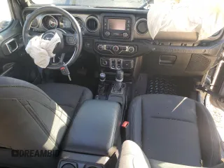2020 Jeep Wrangler Willys with VIN 1C4GJXAG5LW307083, listed as a Copart auction lot 86994744 with 28,873 mi miles and Salvage title. Bid and sale history available at DreamBid. Image 8.