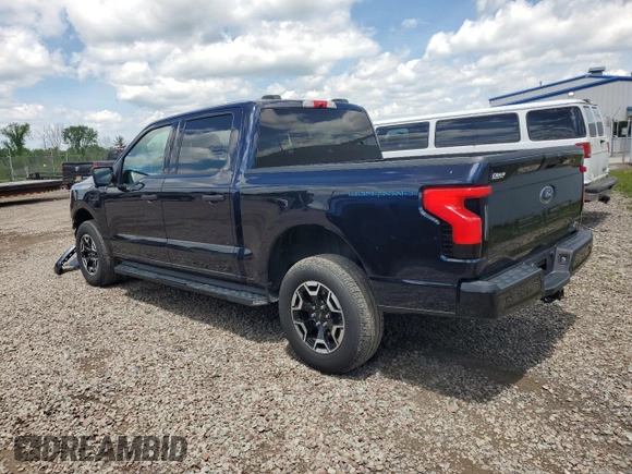 2022 Ford F-150 Lightning Pro z VIN 1FTVW1EL6NWG04931, wystawiony jako Copart lot #59096435 z przebiegiem 26 616 mil mil oraz Szkody całkowita. Historia ofert i sprzedaży dostępna na DreamBid. Obrazek 2.