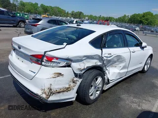 2018 Ford Fusion S z VIN 3FA6P0UU1JR204607, wystawiony jako IAAI lot #41985269 z przebiegiem 116 517 mil mil oraz . Historia ofert i sprzedaży dostępna na DreamBid. Obrazek 6.
