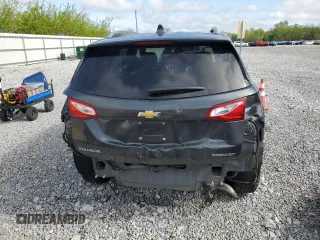 2019 Chevrolet Equinox Premier z VIN 2GNAXNEV5K6302984, wystawiony jako Copart lot #56033935 z przebiegiem 59 554 mil mil oraz Szkoda całkowita • Salvage title. Historia ofert i sprzedaży dostępna na DreamBid. Obrazek 6.