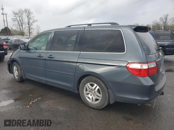 2005 Honda Odyssey EX-L with VIN 5FNRL38695B018174, listed as a Copart auction lot 45573885 with 207,393 mi miles and Salvage Title. Bid and sale history available at carsss.com. Image 2.