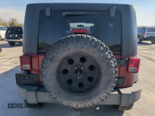 2010 Jeep Wrangler Unlimited Rubicon with VIN 1J4BA6H13AL140902, listed as a Copart auction lot 54335455 with 118,423 mi miles and Clean title. Bid and sale history available at DreamBid. Image 6.