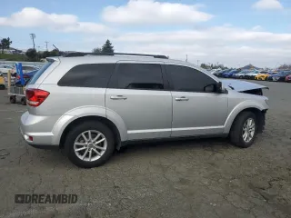 2014 Dodge Journey SXT with VIN 3C4PDCBG5ET227189, listed as a Copart auction lot 88994355 with 166,989 mi miles and Salvage Title. Bid and sale history available at carsss.com. Image 3.