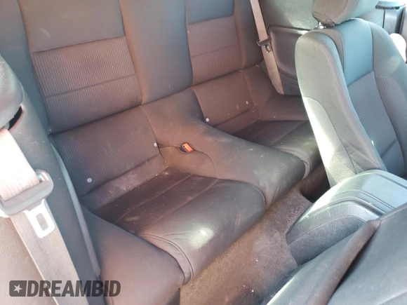 2013 Ford Mustang V6 z VIN 1ZVBP8EMXD5214353, wystawiony jako Copart lot #87087814 z przebiegiem Nie podano mil oraz Szkoda całkowita • Salvage title. Historia ofert i sprzedaży dostępna na DreamBid. Obrazek 10.