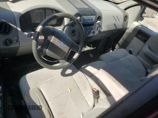 2005 Ford F-150 XL with VIN 1FTRF12W65KC58208, listed as a Copart auction lot 82281114 with 129,774 mi miles and Salvage title. Bid and sale history available at DreamBid. Image 8.