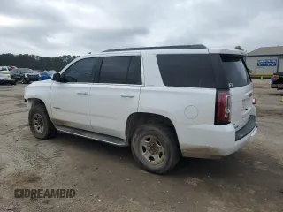 2015 GMC Yukon SLE with VIN 1GKS1AKC7FR119871, listed as a Copart auction lot 43586315 with 194,358 mi miles and Salvage Title. Bid and sale history available at carsss.com. Image 2.